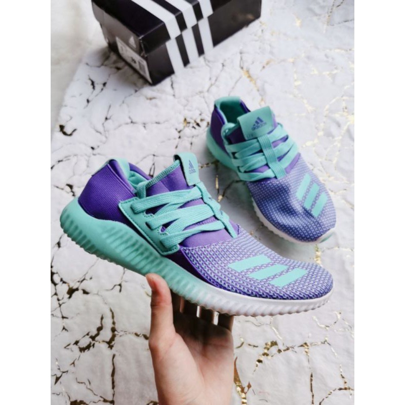 purple and turquoise sneakers