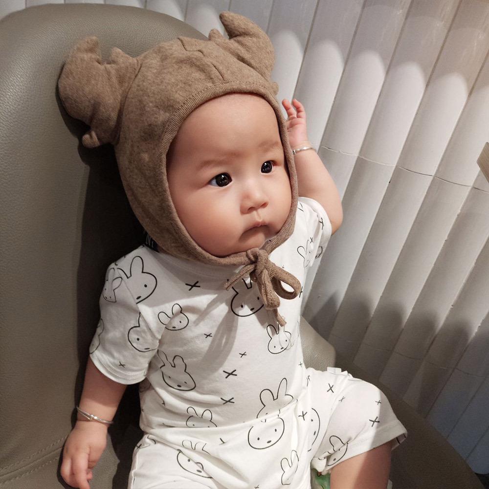 baby hat with strap