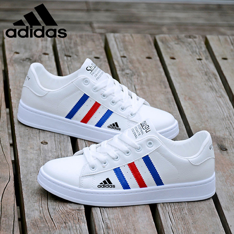 couple sneakers adidas