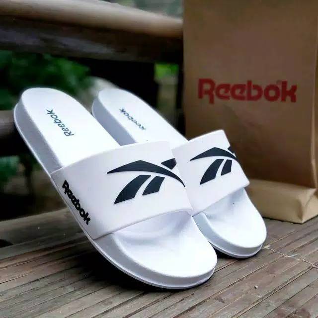 reebok slip on sandals