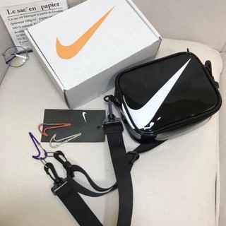 nike swoosh arrow sling bag