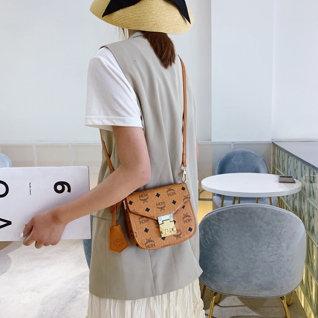 mcm mini sling bag