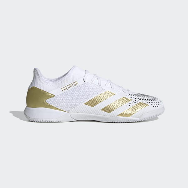 white and gold indoor soccer shoes