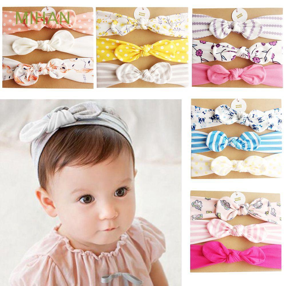 infant girl head bows