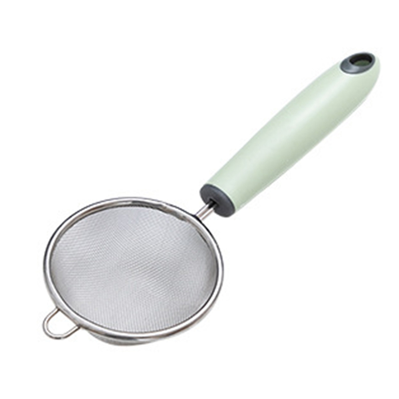 green metal colander