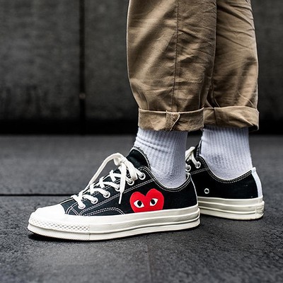 cdg x converse on feet