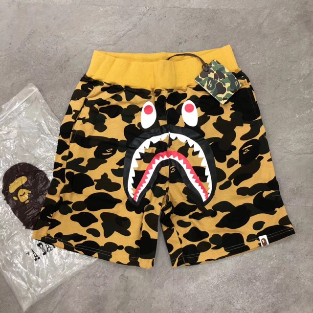 bape yellow camo shorts