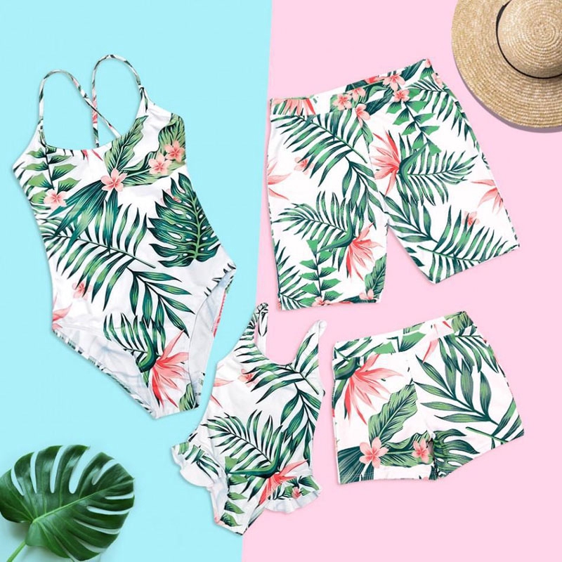mom dad and baby matching swimsuits