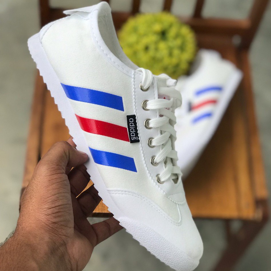 red white and blue adidas sambas