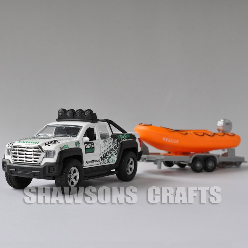 toy pickup truck and boat trailer