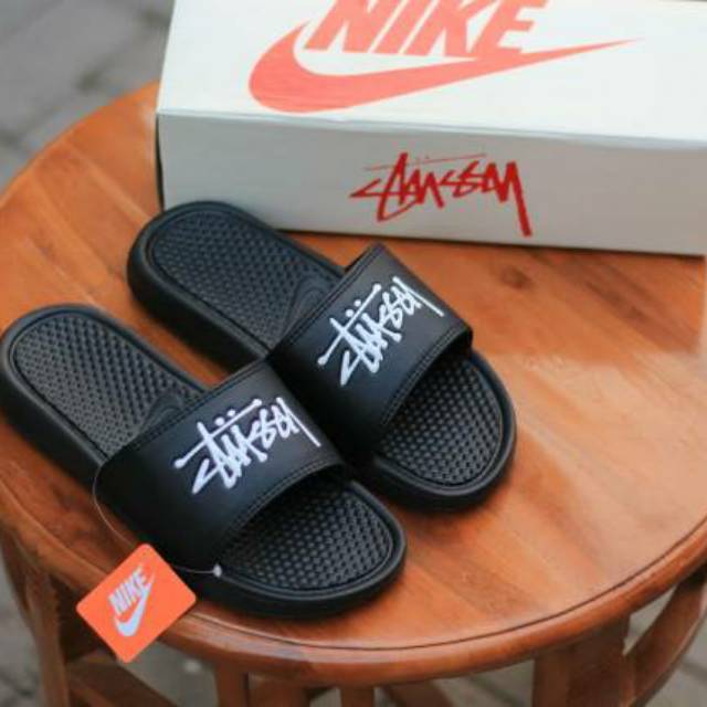 stussy flip flops