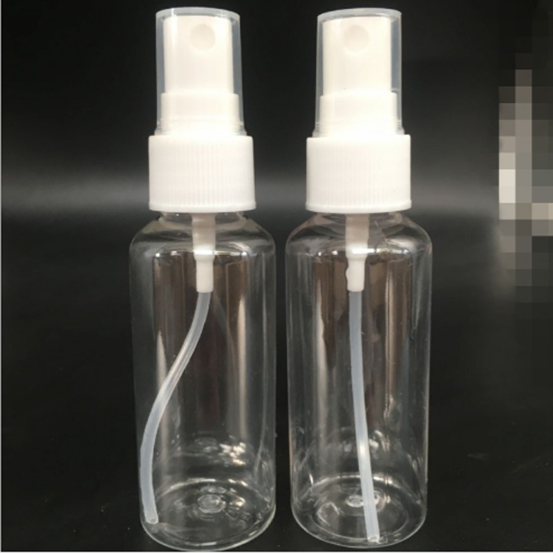 small clear plastic spray bottles