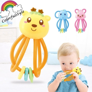 manhattan toy skwish color burst rattle and teether grasping activity toy