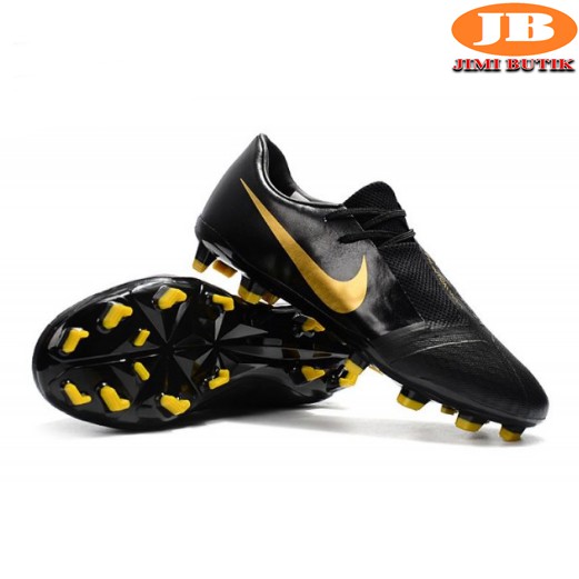 black and gold nike soccer boots