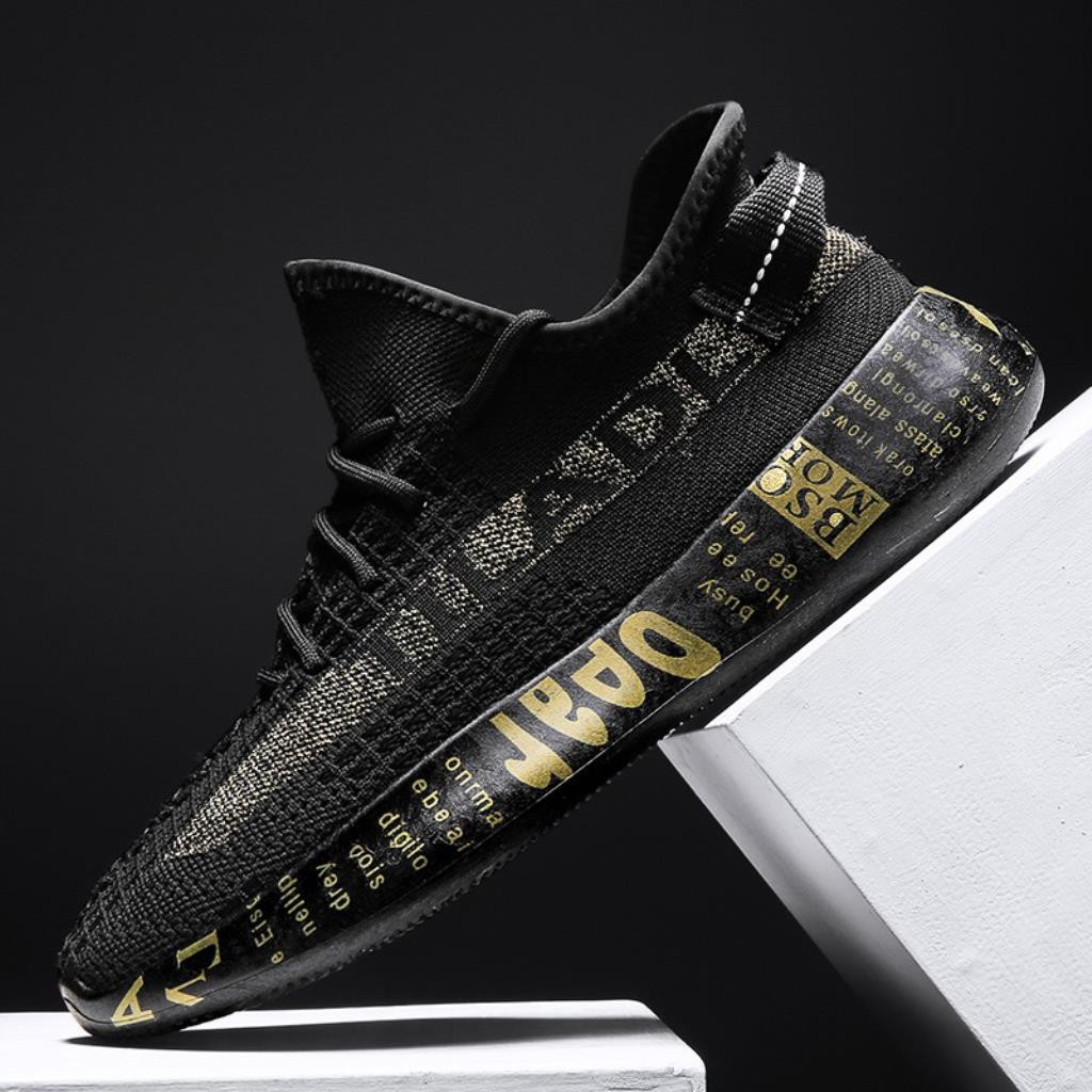 black and gold tennis shoes