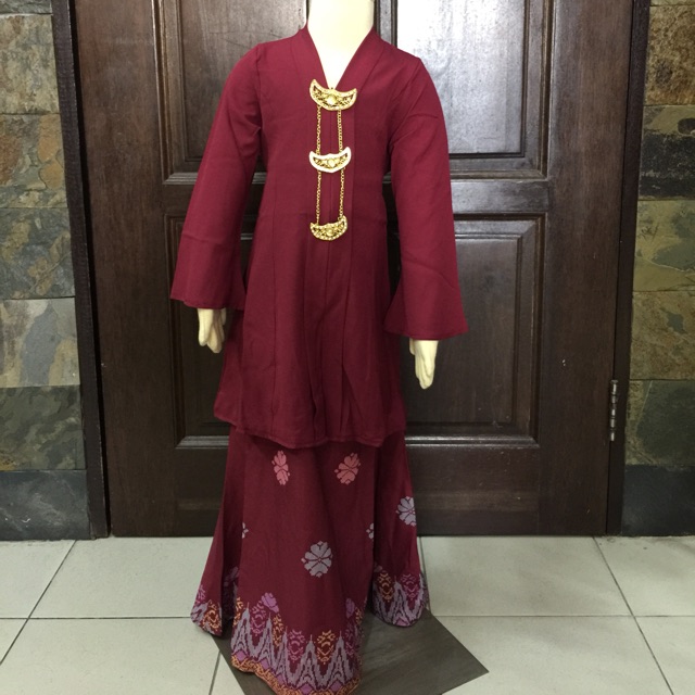 Baju songket perempuan