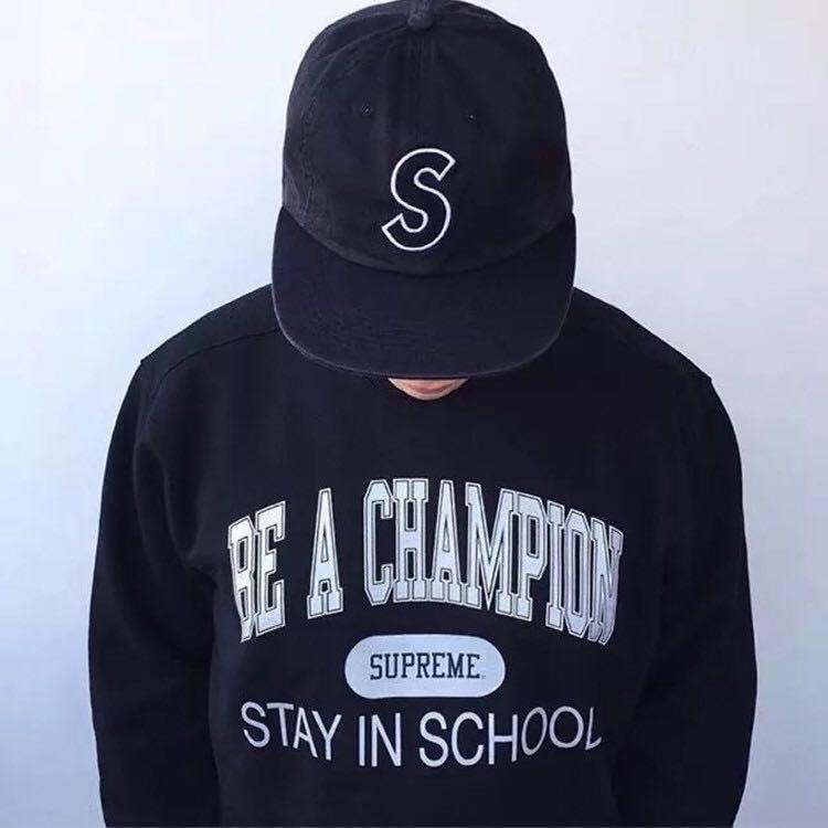 harga hoodie supreme x champion original