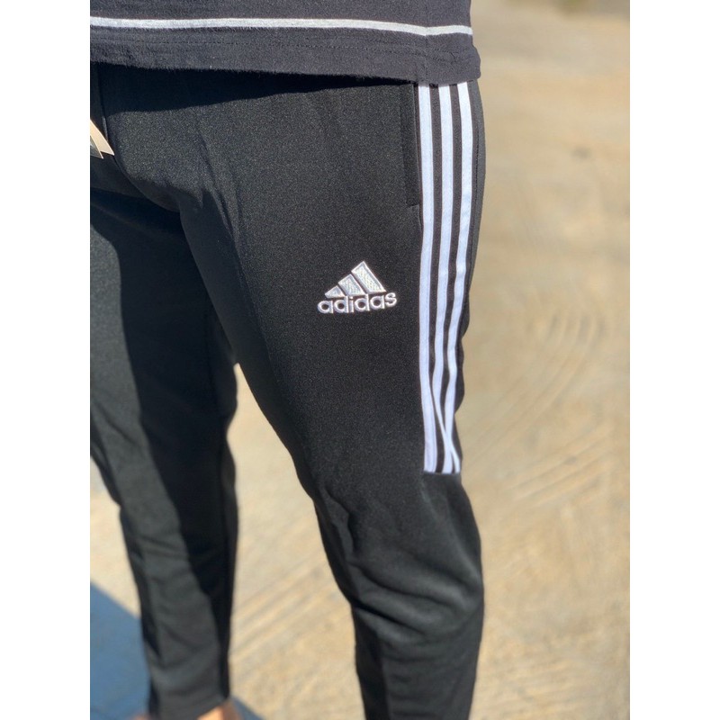 adidas pants with stripes halfway down