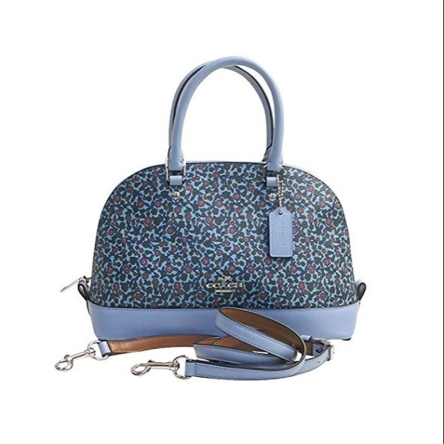 blue coach bag with flowers