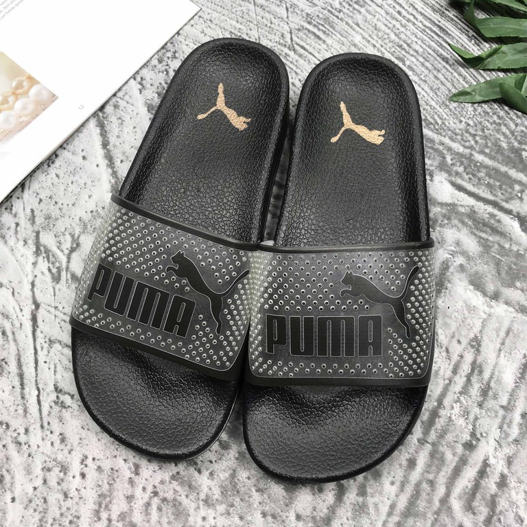 black puma slides