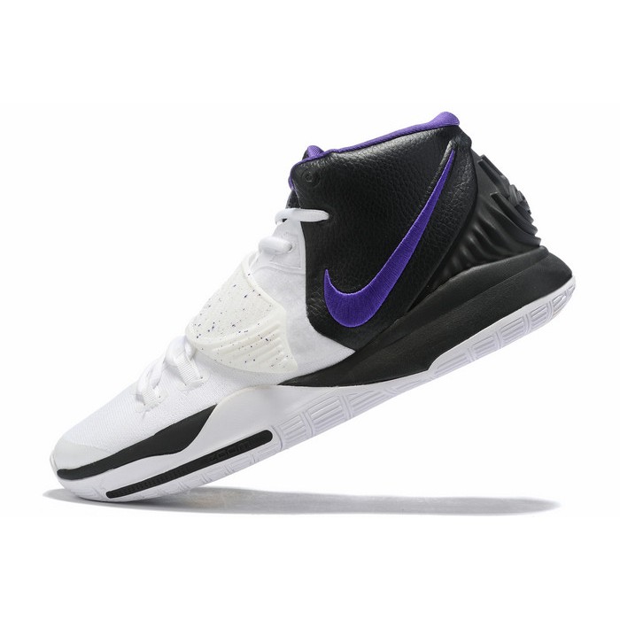 white and purple basketball shoes