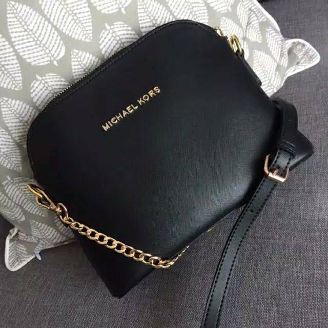 harga sling bag michael kors