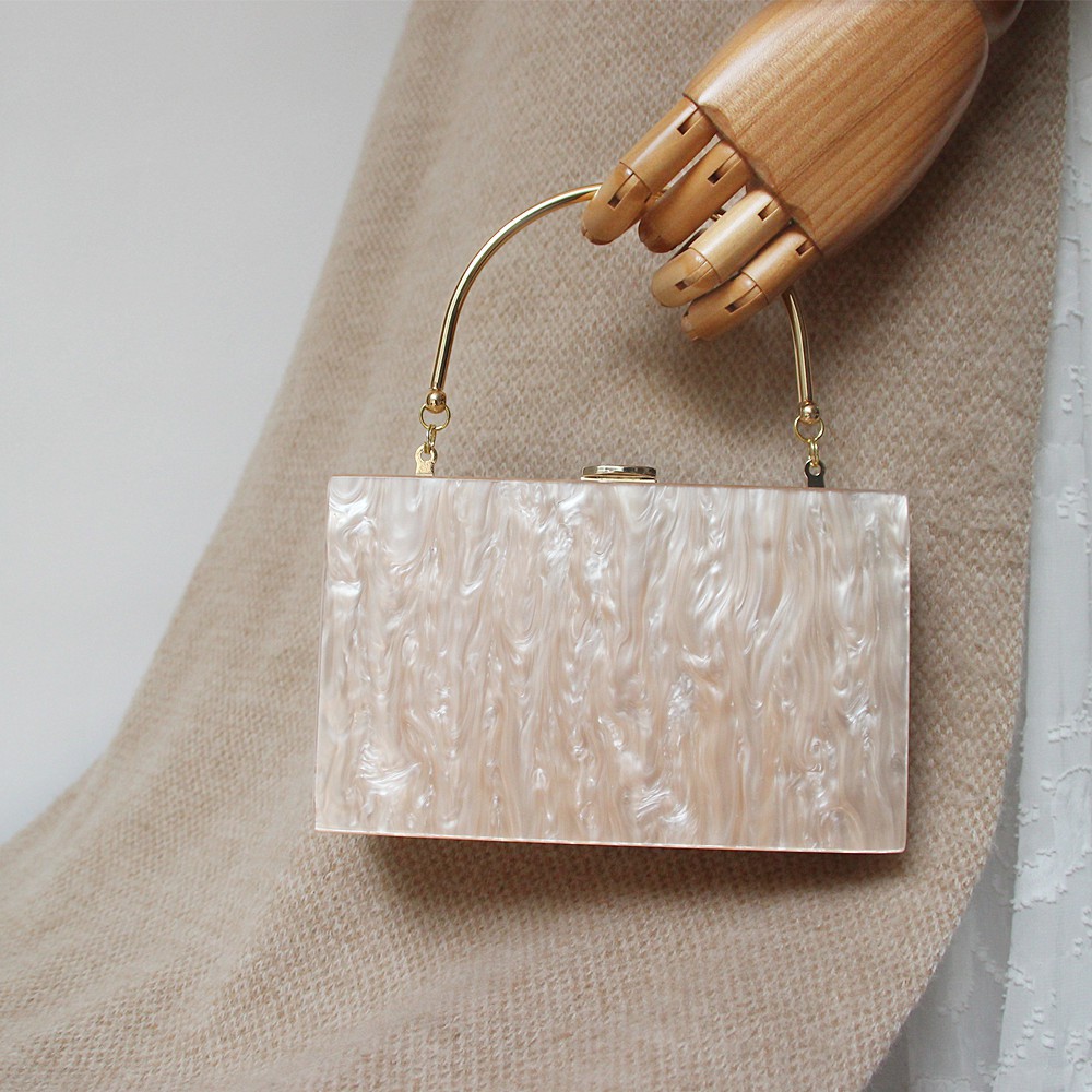 beige clutch purse