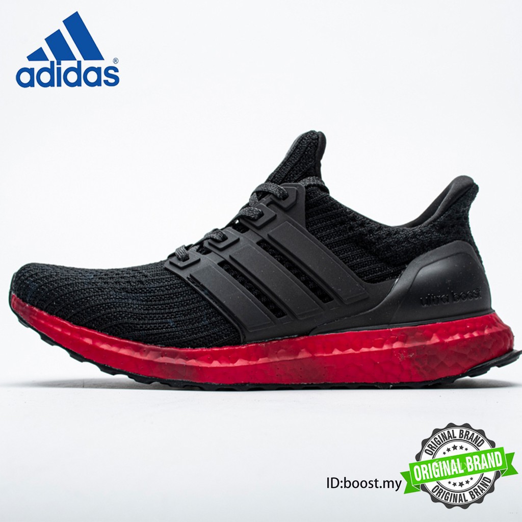 black and red running shoes