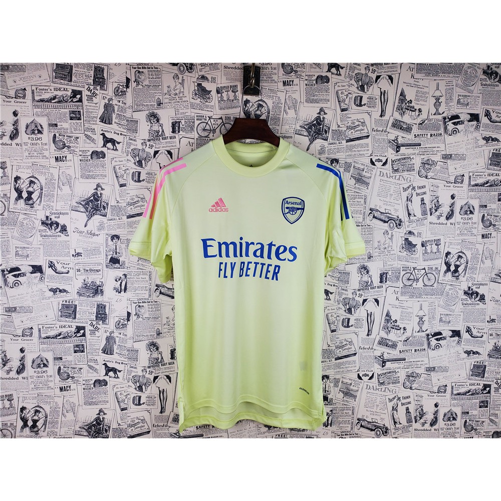 arsenal yellow training top