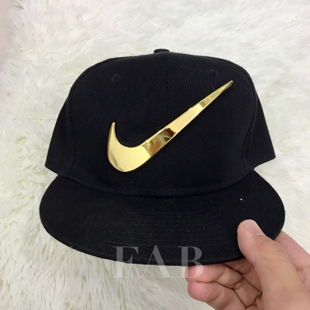 nike cap gold logo
