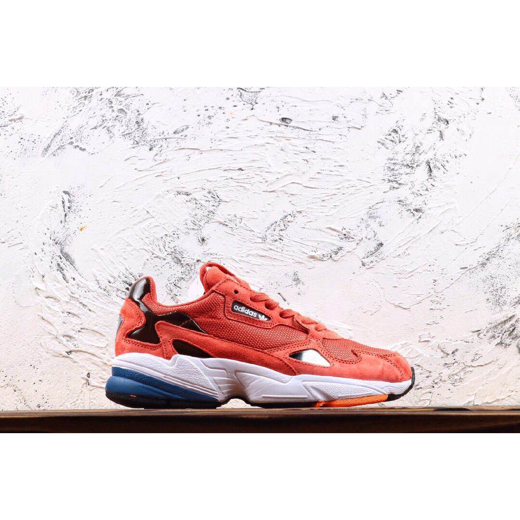 adidas shoes with orange soles