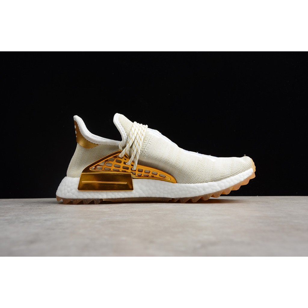 nmd human race gold