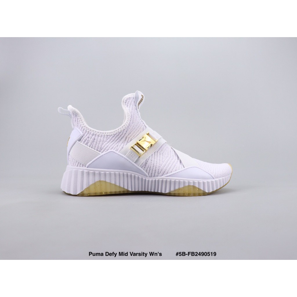 puma defy mid varsity white