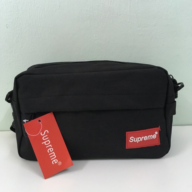 supreme clutch bag