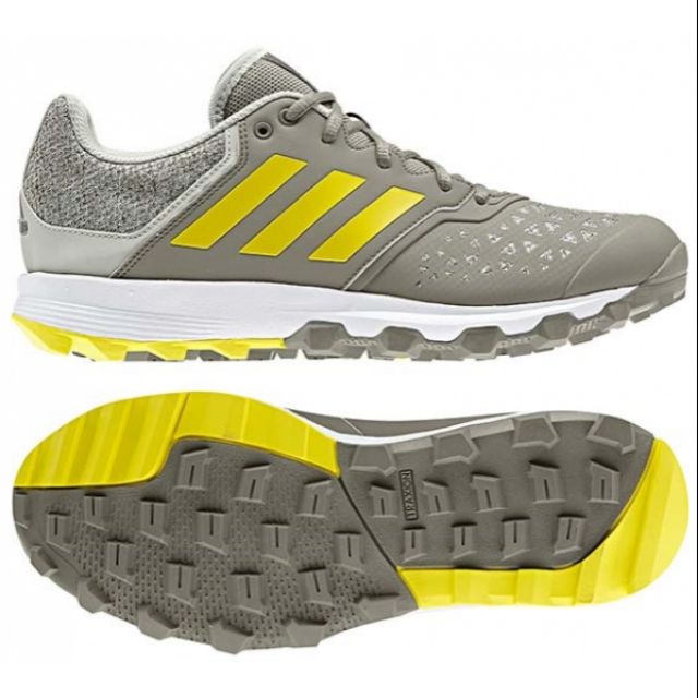 yellow adidas hockey shoes