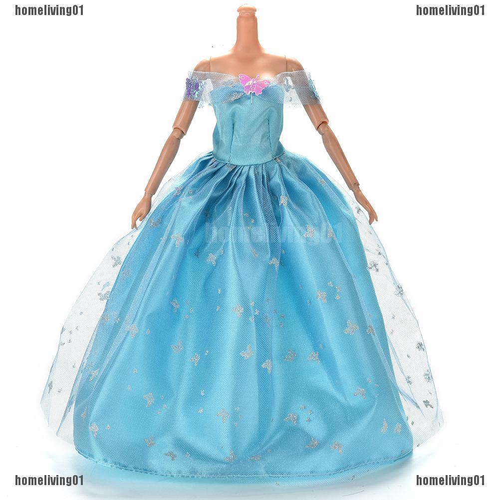 barbie doll in blue dress