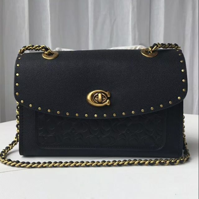 coach parker in signature leather with rivets