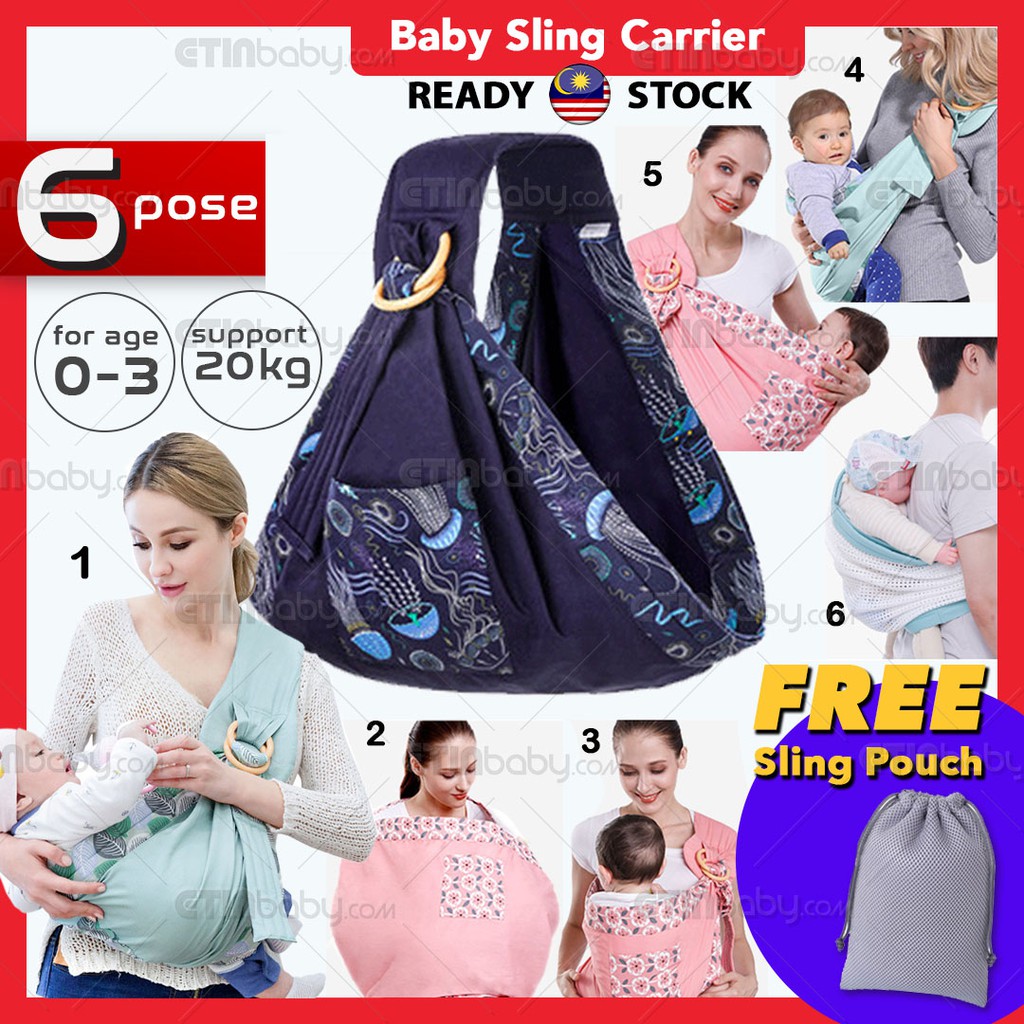 baby wearing sling