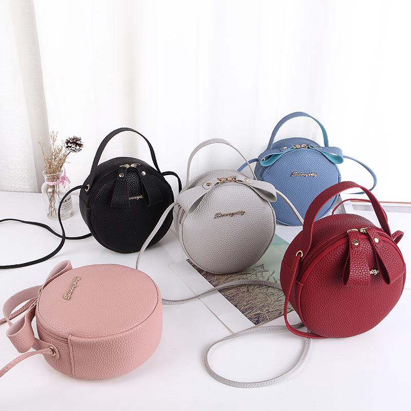 sling round bag