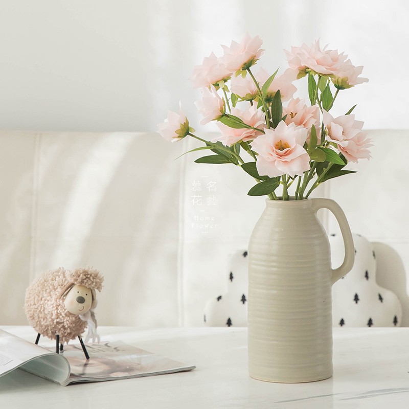 artificial silk flowers in vase