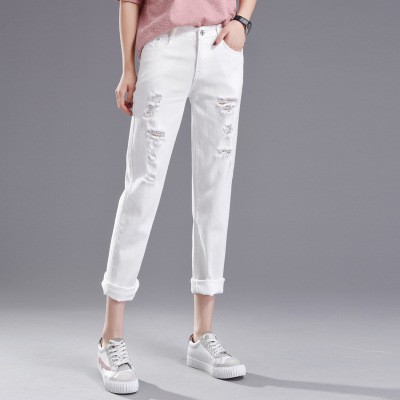 ladies white ripped jeans