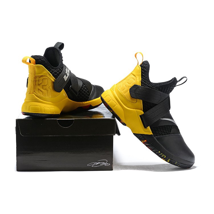 lebron james black and yellow shoes