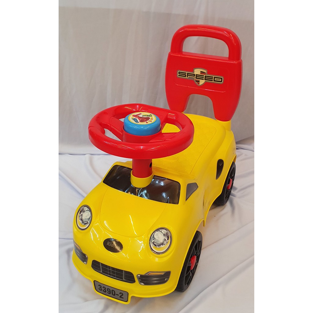 childrens red and yellow car