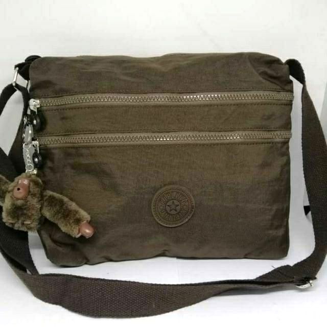 handbag with monkey keychain