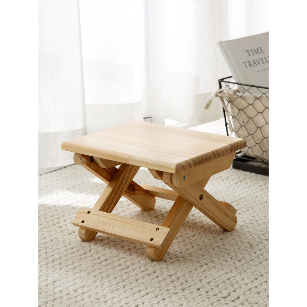 small folding wooden stool