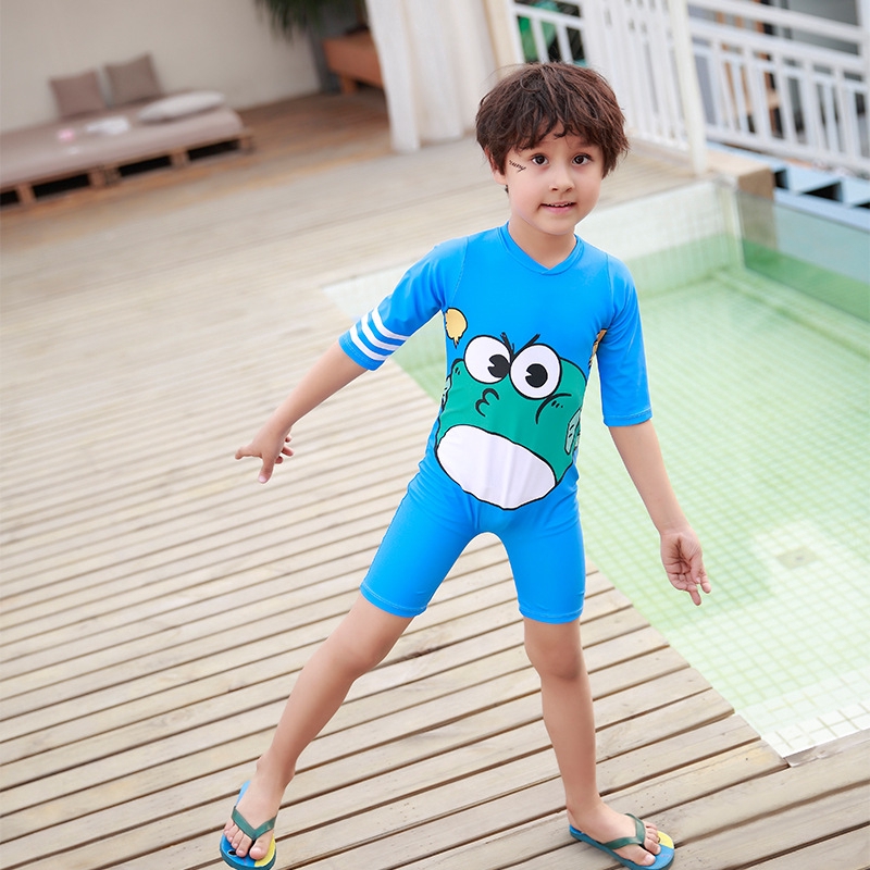 boy wearing one piece swimsuit