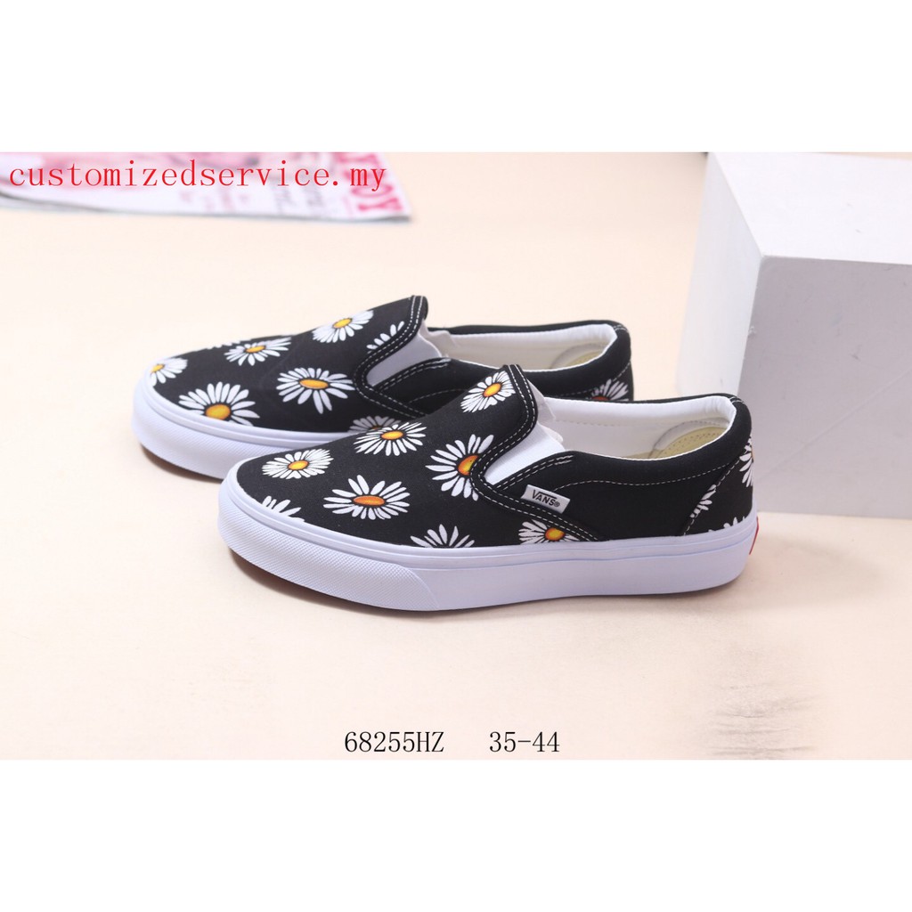 vans era big daisies