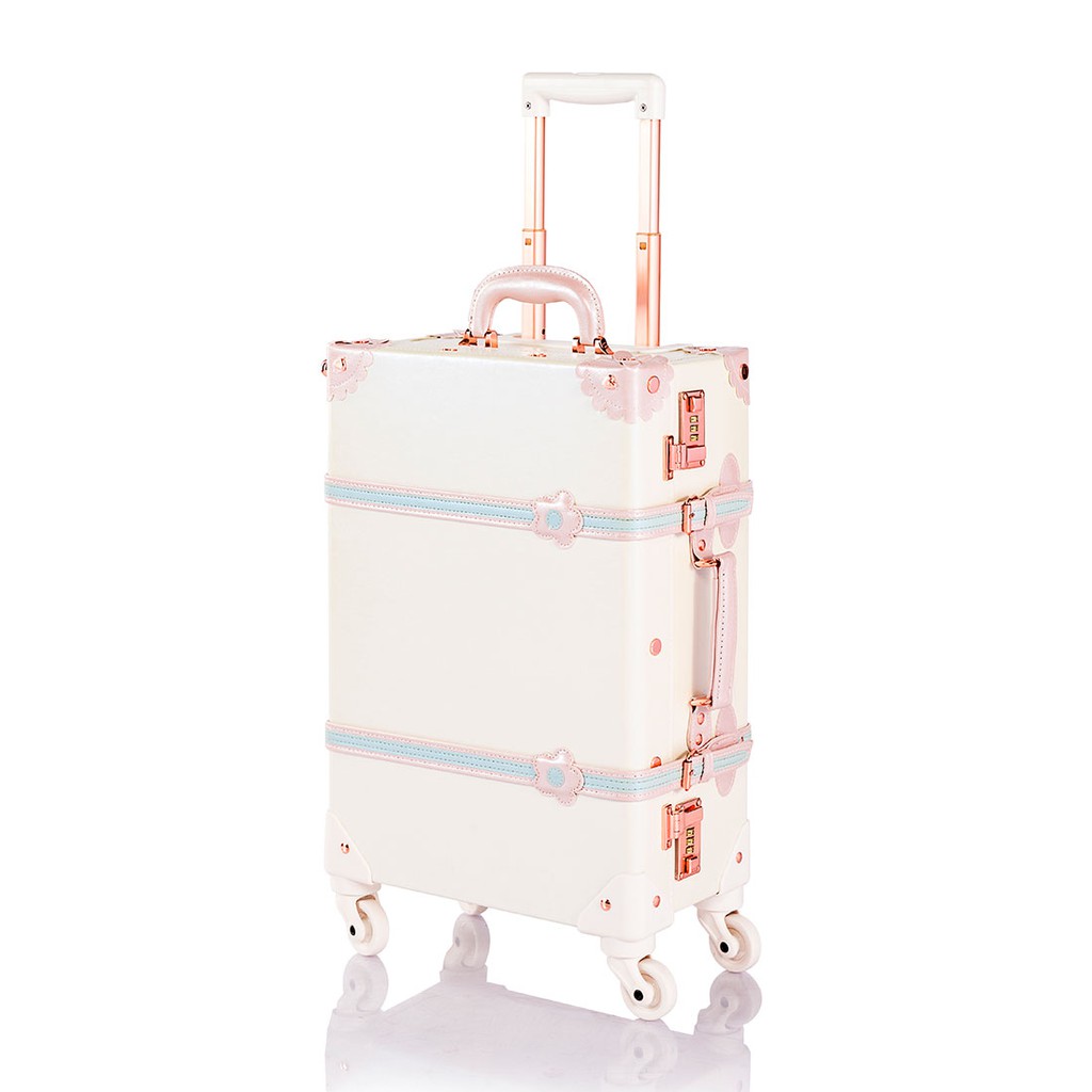 white suitcase carry on