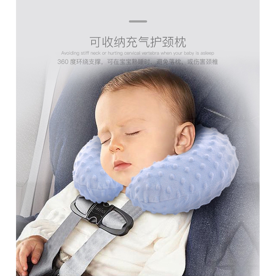 baby in a neck pillow