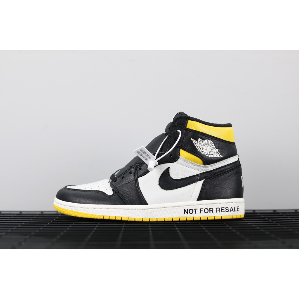 black white and yellow jordan 1